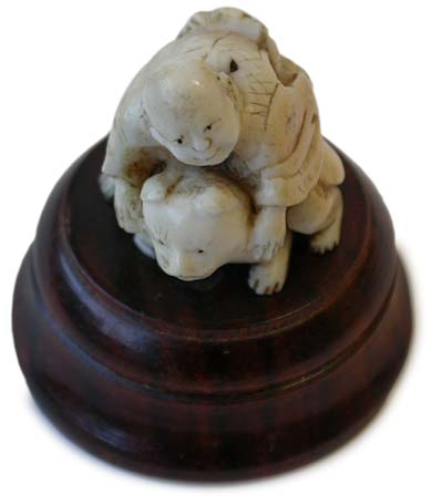 Boy Catching Tanuki Child Netsuke