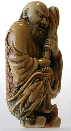 Rakan Taming Dragon netsuke