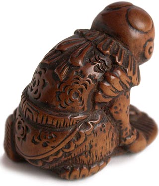 Flying Doji Wood Netsuke rt back