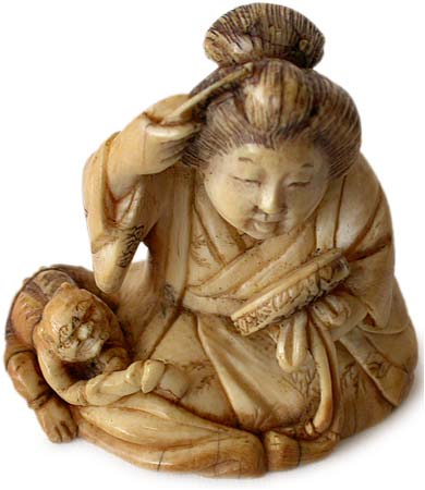 Okame Oni Netsuke