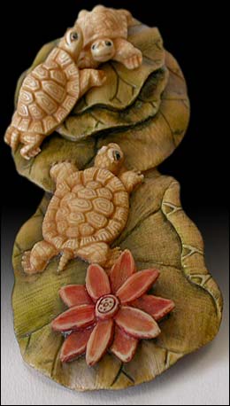 Three Turtles on Lotus Netsuke