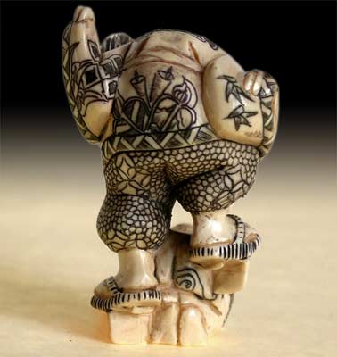 Noh Mask Bakamono Netsuke back