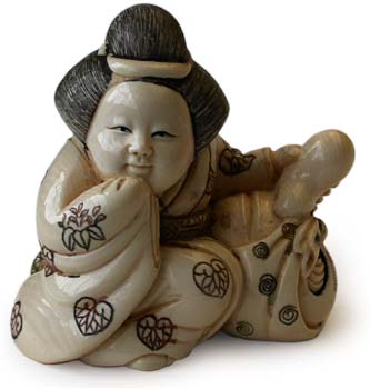 Okame Playing Tengu Netsuke
