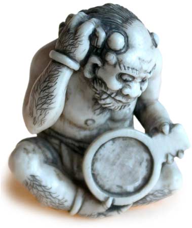 Oni Grooming Netsuke