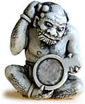 Oni Grooming Netsuke