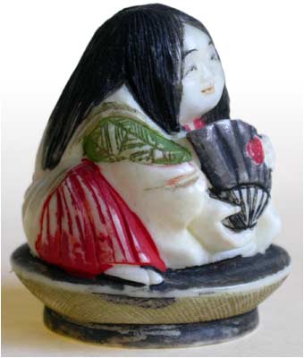 Girl on Saki Cup Netsuke 