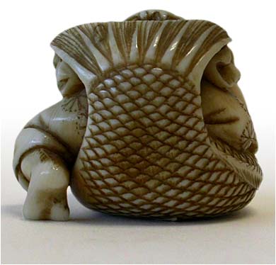 Ebisu on Carp Netsuke back