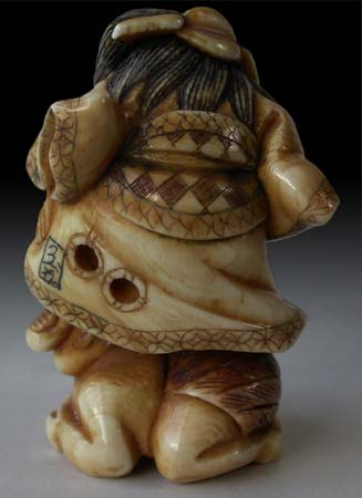 Shoki on Demon Netsuke back