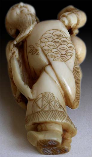 Traveling Sennin Scholar Netsuke bottom